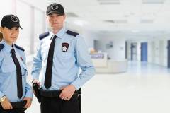 Two security guard in office.